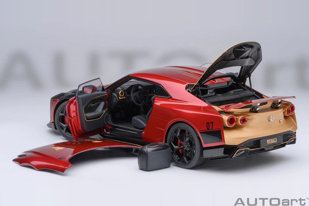 AUTOart Aa77514 Nissan GT-R50 Metallic Red/Gold - open doors, hood and hatch with included bag