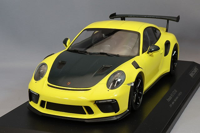 MINICHAMPS MC155068231 1/18 Porsche 911 GT3 RS 2019 in Yellow, front three-quarter view on display base