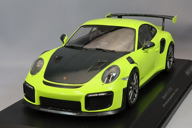 MINICHAMPS MC155068309 1/18 Porsche 911 GT2 RS 2018 in Green, front three-quarter view on display base
