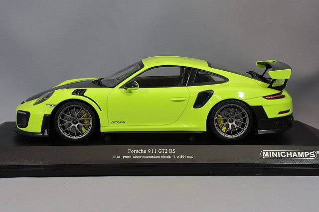 MINICHAMPS MC155068309 1/18 Porsche 911 GT2 RS 2018 in Green, side view on display base