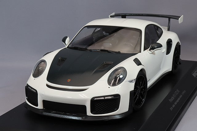 MINICHAMPS MC155068310 1/18 Porsche 911 GT2 RS 2018 in White, front three-quarter view on display base