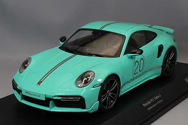 MINICHAMPS MC155069175 1/18 Porsche 911 Turbo S 2021 in Green, front three-quarter view on display base