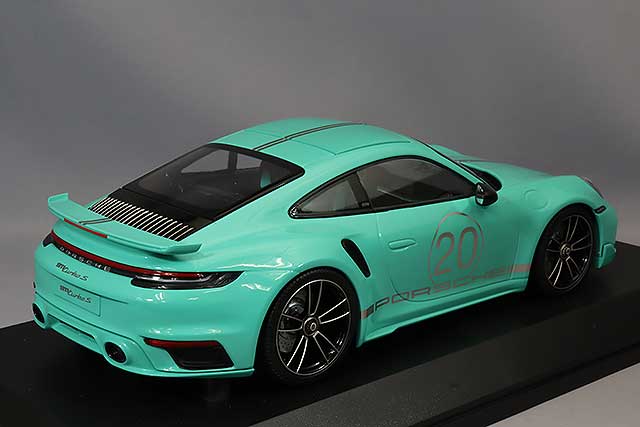 MINICHAMPS MC155069175 1/18 Porsche 911 Turbo S 2021 in Green, rear three-quarter view on display base